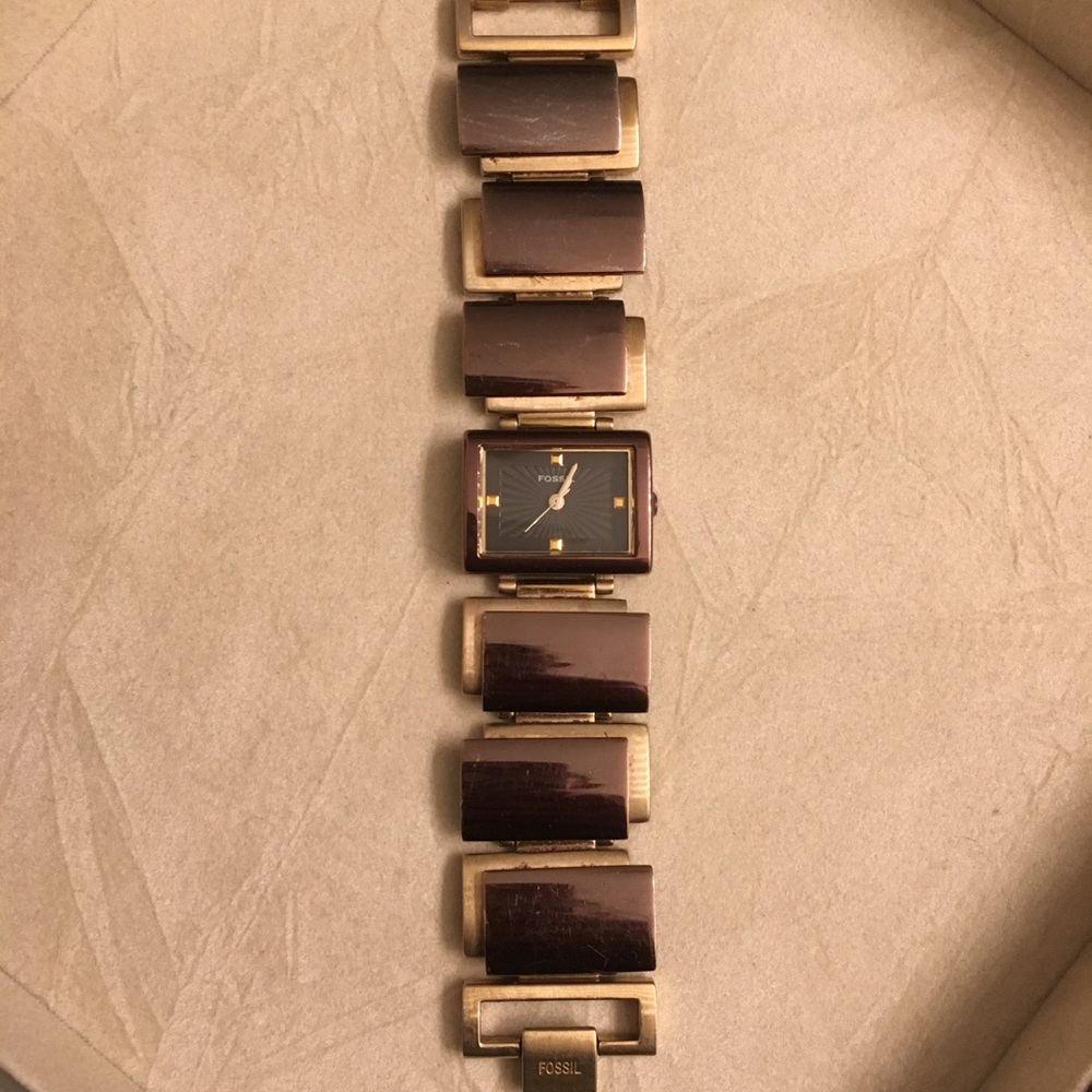 Brown and gold Fossil watch
